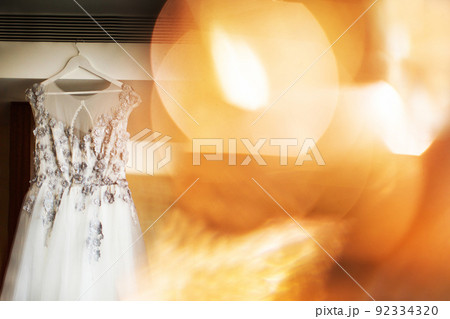 Wedding dress on the wall with highlights 92334320