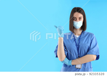 Concept of healthcare worker with young woman, space for text Concept of healthcare worker with young woman, space for text 92335320