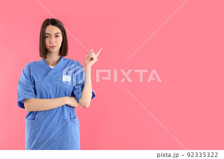 Concept of healthcare worker with young woman, space for text Concept of healthcare worker with young woman, space for text 92335322