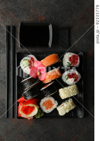 Concept of tasty food with sushi, top view Concept of tasty food with sushi, top view 92335778