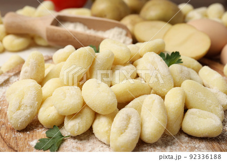 Concept of cooking with raw potato gnocchi, close up 92336188