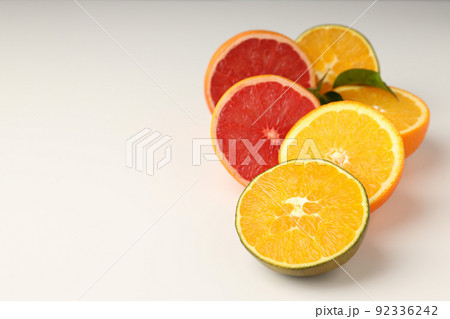 Citrus fruits on white background, space for text Citrus fruits on white background, space for text 92336242