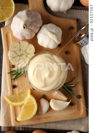 Concept of tasty food with garlic sauce, top view 92337507