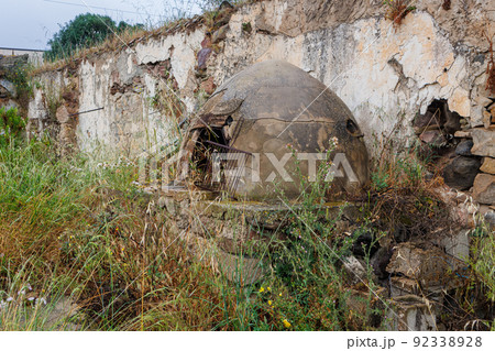 Old dilapidated abandoned house with traditional oven on the island of Sardinia 92338928