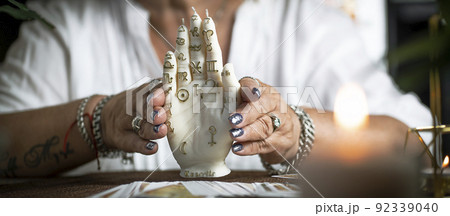 Concept of psychic advisor or ways of divination with cards. Concept of psychic advisor or ways of divination with cards. 92339040
