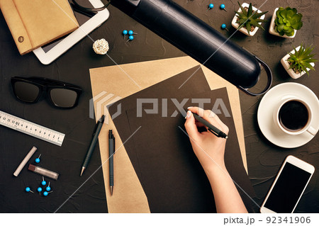 Architect working on blueprint. Architects workplace - architectural project, blueprints, tablet pc. Engineering tools. Top view Architect working on blueprint. Architects workplace - architectural project, blueprints, tablet pc. Engineering tools. Top view 92341906
