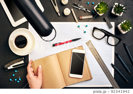 Architect working on blueprint. Architects workplace - architectural project, blueprints, tablet pc. Engineering tools. Top view 92341942