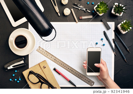 Architect working on blueprint. Architects workplace - architectural project, blueprints, tablet pc. Engineering tools. Top view 92341946