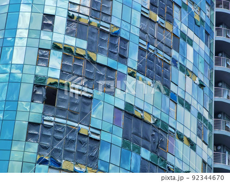Kyiv, Ukraine - July 10, 2022: The building renovation after Russian rocket attack on Kyiv 92344670