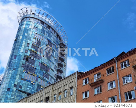 Kyiv, Ukraine - July 10, 2022: The building renovation after Russian rocket attack on Kyiv Kyiv, Ukraine - July 10, 2022: The building renovation after Russian rocket attack on Kyiv 92344672