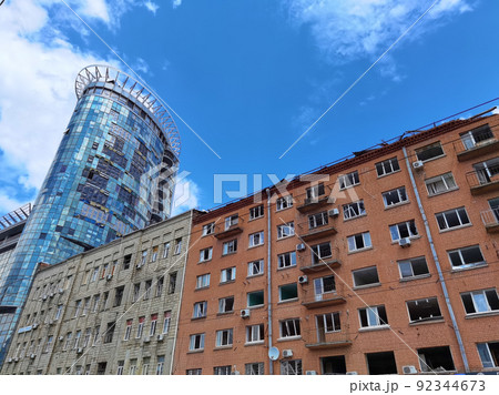 Kyiv, Ukraine - July 10, 2022: The building renovation after Russian rocket attack on Kyiv Kyiv, Ukraine - July 10, 2022: The building renovation after Russian rocket attack on Kyiv 92344673