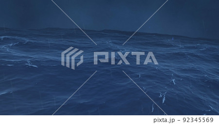 ocean waves with clear sky and sun rays on blue water 92345569