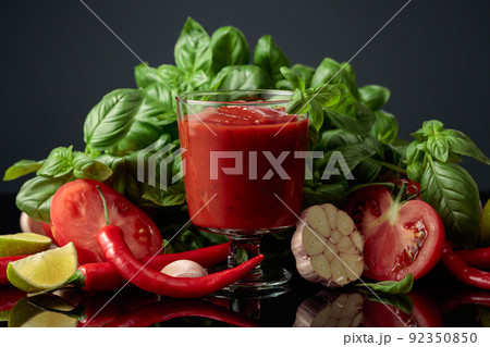 Spicy tomato sauce with ingredients. 92350850