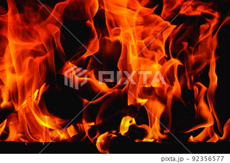 Fire. Fire texture. Burning wood in the fireplace. Close-Up Of Fire In The Dark. Fire flames burning isolated on black background. Fire. Fire texture. Burning wood in the fireplace. Close-Up Of Fire In The Dark. Fire flames burning isolated on black background. 92356577