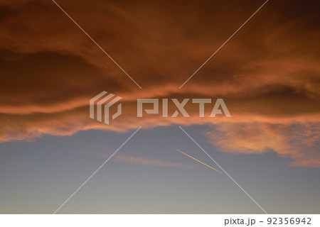 A Sky light after sunset. orange background A Sky light after sunset. orange background 92356942