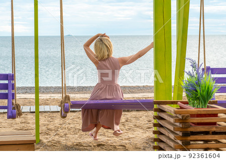 Swing happy sea beach travel summer woman leisure thailand asia, from traveler phuket for tropical from island relax, blue coast. Happiness sunset inspiration, swinging 92361604
