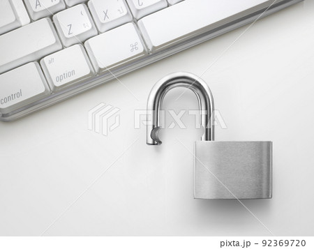 Computer security concept. Unlocked padlock on laptop keyboard. Symbol of safe 92369720