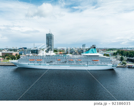 Beautiful cruise ship docked in Riga, Latvia near the old town and the bridge. Beautiful cruise ship docked in Riga, Latvia near the old town and the bridge. 92386035