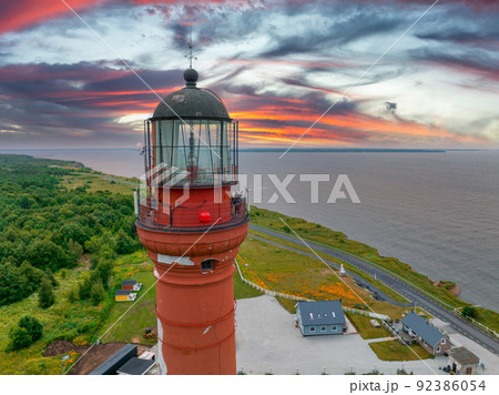 Beautiful limestone cliff on Pakri peninsula, Estonia with the historic lighthouses. Beautiful limestone cliff on Pakri peninsula, Estonia with the historic lighthouses. 92386054