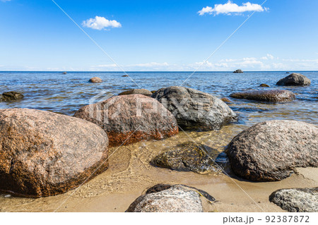 Shoreline in the baltic sea during summer with boulders 92387872