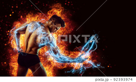 Brutal strong athletic Bodybuilder posing. Fire and spark explosion in the background. Brutal strong athletic Bodybuilder posing. Fire and spark explosion in the background. 92393974