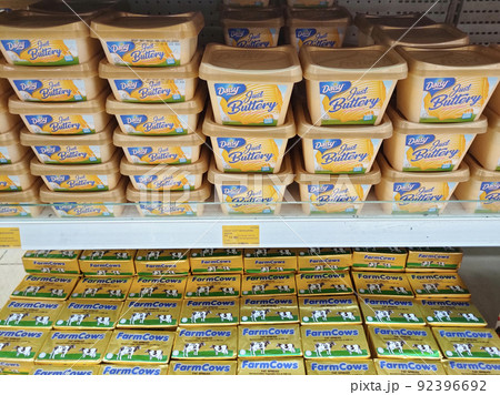 MELAKA, MALAYSIA -JANUARY 4, 2022: Different types of margarine are displayed for sale in coolers. Neatly arranged to attract customers. Marked with a price tag. 92396692