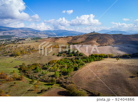 Italy from above - flight over beautiful rural landscapes and amazing nature Italy from above - flight over beautiful rural landscapes and amazing nature 92404866