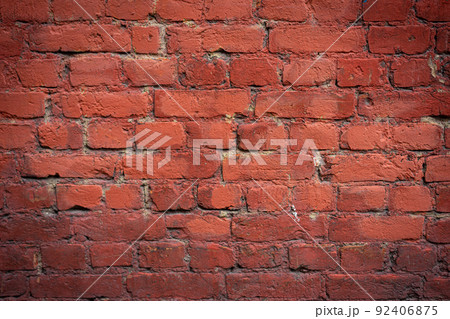 Empty brick red wall. background of a old brick house. Empty brick red wall. background of a old brick house. 92406875