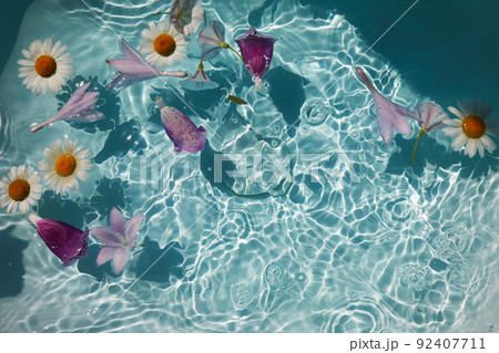 Top view of bath filled with flowers spa or selfcare concept Top view of bath filled with flowers spa or selfcare concept 92407711