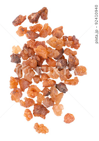 Myrrh resin isolated on white background. Pile of natural Commiphora myrrha. Sweet Myrrh Opoponax. Incense. Top view. 92410940