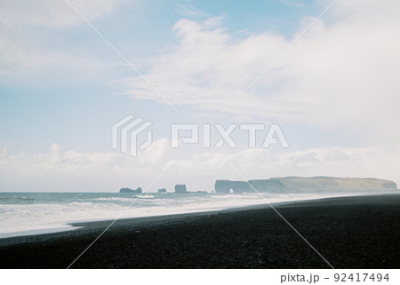 Black sand of Vik beach in Iceland 92417494