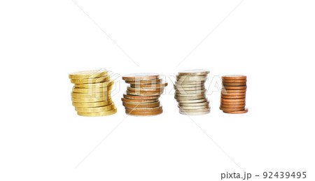 Multiple coins stacked on each other in different positions,objects isolated on white background 92439495