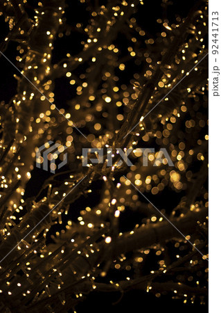 Garlands shot in blur. Backdrop of lights in dark. Lot of light bulbs are lit at festival. Garlands shot in blur. Backdrop of lights in dark. Lot of light bulbs are lit at festival. 92441713