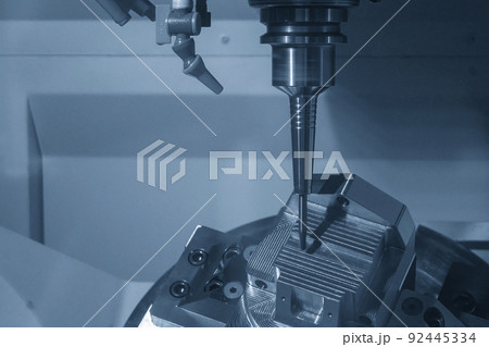 The 5-axis CNC milling machine  cutting the metal mold part. 92445334