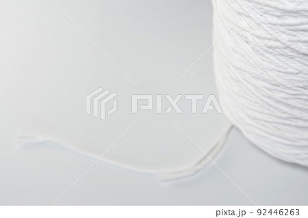 Roll of white rope isolated on white background 92446263