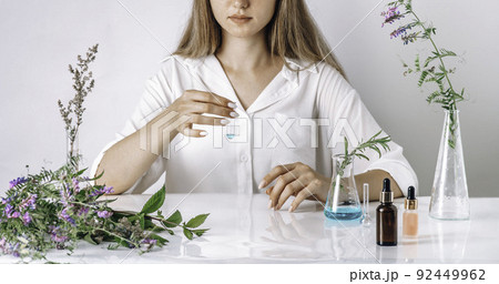 Woman working with cosmetic, scientist,doctor, make alternative herb medicine with herbal the organic natural in the laboratory. oil capsule, natural organic skincare and cosmetic. Woman working with cosmetic, scientist,doctor, make alternative herb medicine with herbal the organic natural in the laboratory. oil capsule, natural organic skincare and cosmetic. 92449962