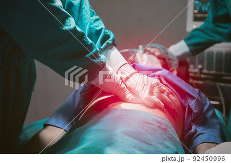 Medical team saving people life in hospital. Doctor first aid emergency CPR patient heart failure. Medical team saving people life in hospital. Doctor first aid emergency CPR patient heart failure. 92450996