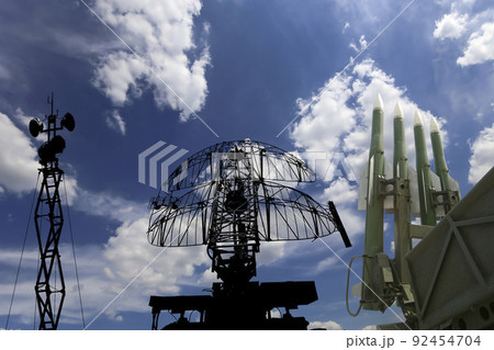 Air defense radars of military mobile anti aircraft systems and modern Russian anti aircraft missiles OSA-AKM on background clouds and sky,Russia 92454704