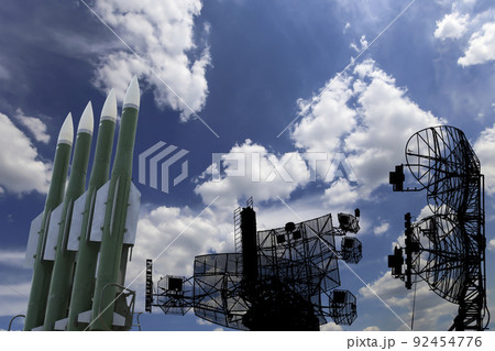 Air defense radars of military mobile anti aircraft systems and modern Russian anti aircraft missiles OSA-AKM on background clouds and sky,Russia 92454776