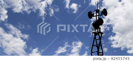 Contour small military radar station on background beautiful clouds and sky. Mobile relay station, Russia Contour small military radar station on background beautiful clouds and sky. Mobile relay station, Russia 92455745