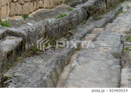 Ancient road chufut cave city bakhchisaray crimea medieval fortress stone, concept landscape blue in architecture for travel chufut, mountain karaite. View scene moutain, 92460024