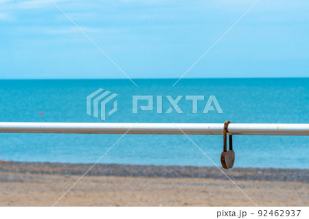 Background chain metal blurred sea old love rusty selective padlock, concept lock iron from railing from lover dating, shaped rustic. Eternity married, 92462937