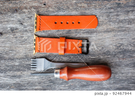 Orange leather smart watch strap hand made on wood Orange leather smart watch strap hand made on wood 92467944