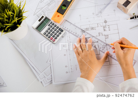 Top view of architect drawing with ruler on house plan blueprint paper for repair tools 92474762
