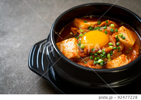 Kimchi Soup with Tofu and Egg or Korean Kimchi Stew Kimchi Soup with Tofu and Egg or Korean Kimchi Stew 92477228