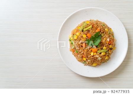 fried rice with green peas, carrot and corn 92477935