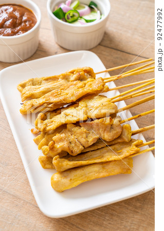 Pork satay - Grilled pork served with peanut sauce or sweet and sour sauce 92477992