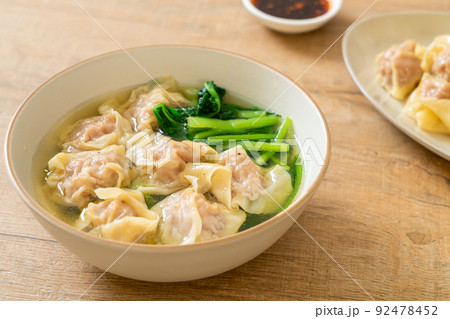 pork wonton soup or pork dumplings soup with vegetable pork wonton soup or pork dumplings soup with vegetable 92478452