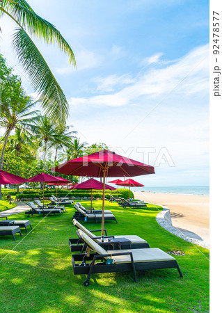 beach chair and umbrella with sea beach background beach chair and umbrella with sea beach background 92478577