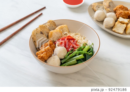 egg noodles with fish balls and shrimp balls in pink sauce, Yen Ta Four or Yen Ta Fo egg noodles with fish balls and shrimp balls in pink sauce, Yen Ta Four or Yen Ta Fo 92479186